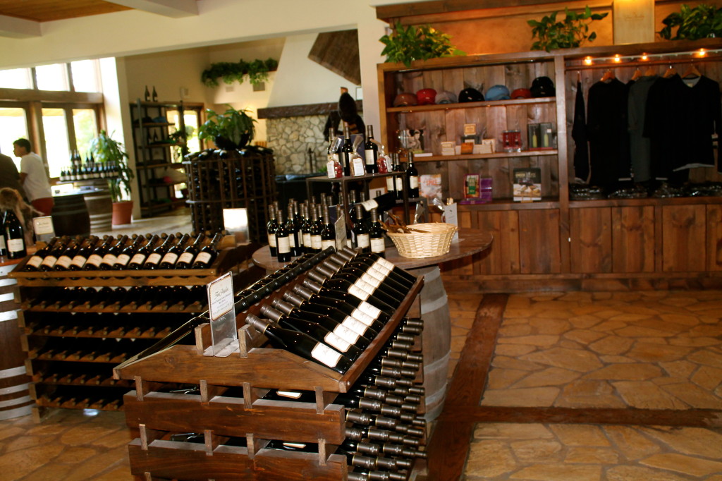 Fess Parker Winery tasting room resembles a lodge with soaring ceilings and floor to ceiling windows that overlook the grounds