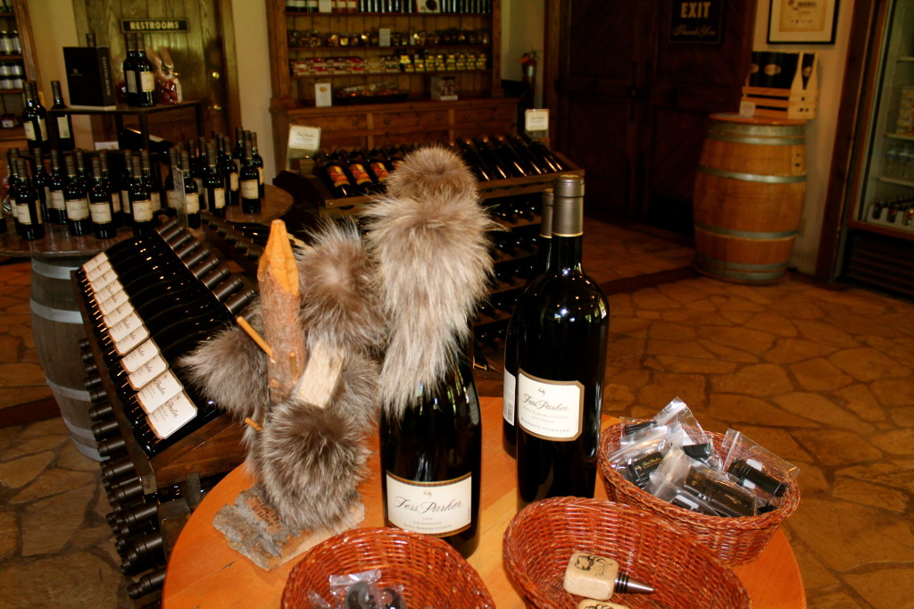 Raccoon skin caps adorn the wine bottles and shelves as a tribute to founder Fess Parker, aka Davy Crockett